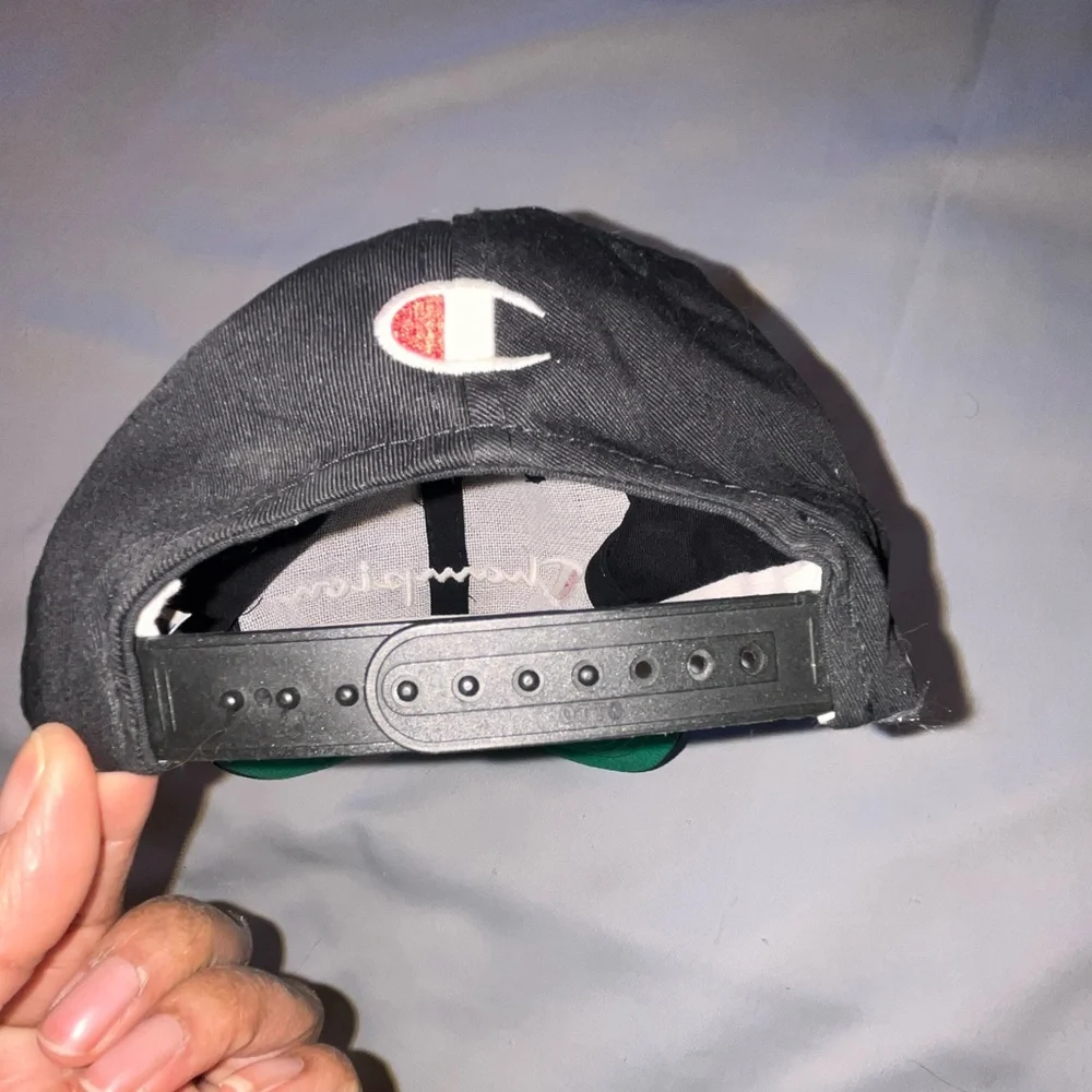 Champion Black Snap Back Hat Champion Embroidered On Front In White One Size